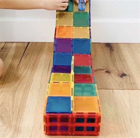 Incorporating storytelling and imagination into play with magic magnetic tiles